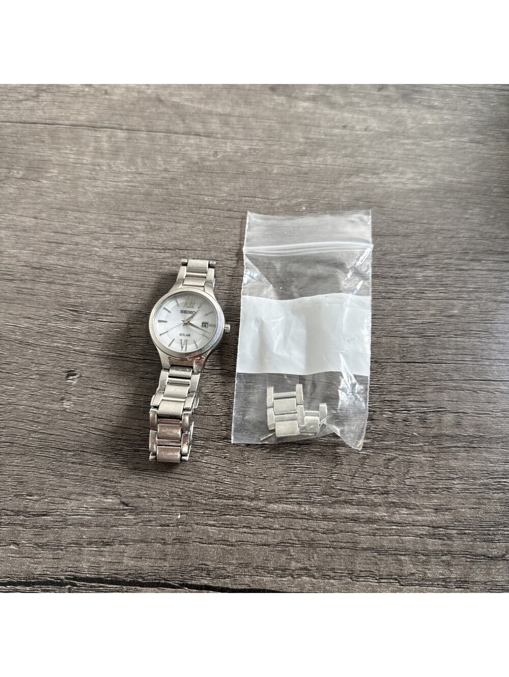 Seiko Solar Womens Watch Silver Tone Stainless Steel V137-0BH0